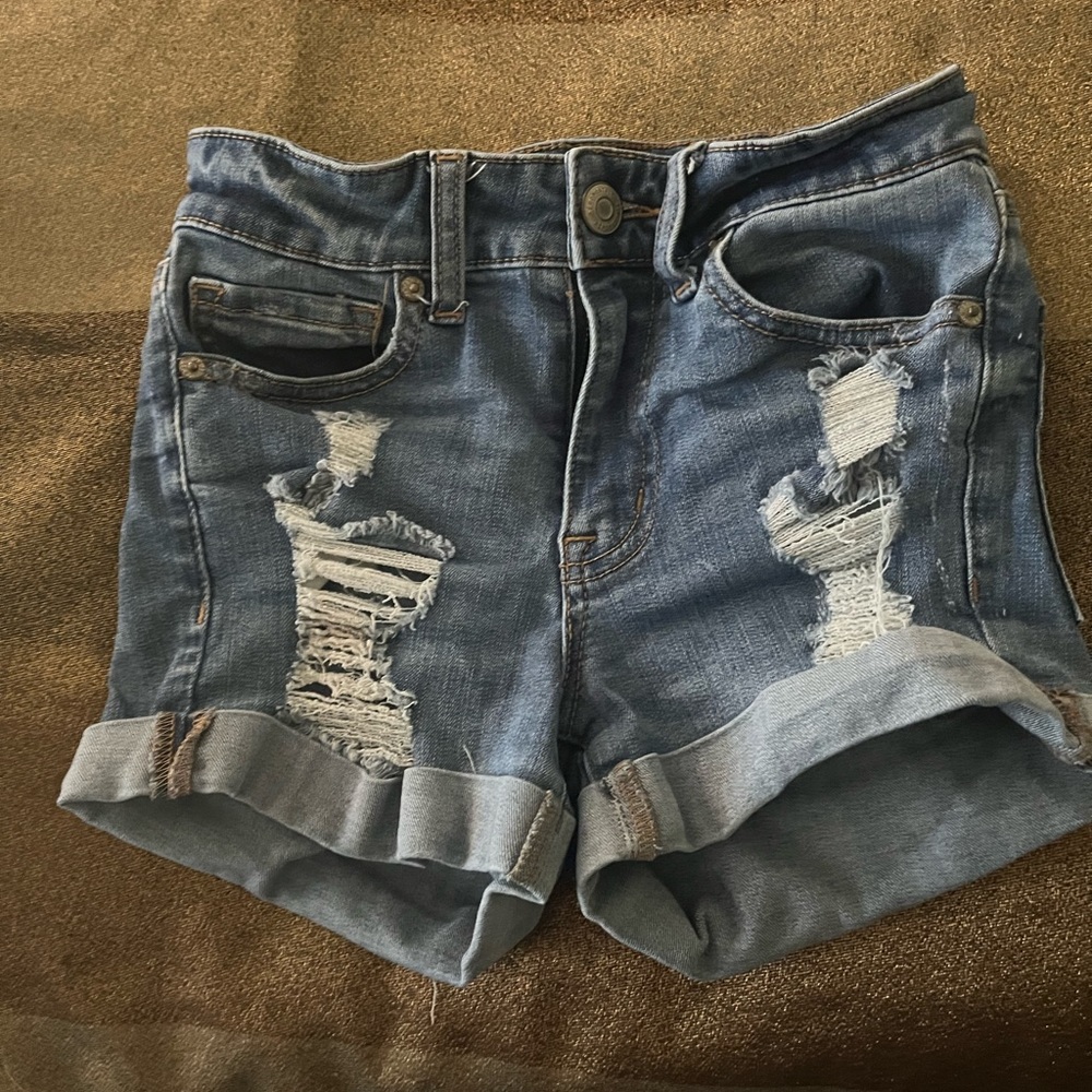 light jean ripped shorts